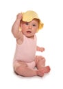 Baby girl wearing yellow sun hat Royalty Free Stock Photo