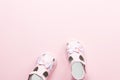 Baby girls accessories - pink sandals, copy space. Childhood concept flat lay Royalty Free Stock Photo