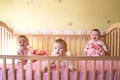 Baby Girls in Crib - Triplets Royalty Free Stock Photo