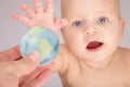 Baby & globe Royalty Free Stock Photo