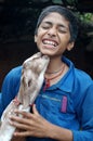 Baby Goat kissing a boy