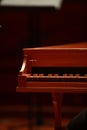 Baby grand piano, piano keys, golden piano keys on an old baroque clavichord Royalty Free Stock Photo