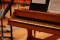 Baby grand piano, piano keys, golden piano keys on an old baroque clavichord Royalty Free Stock Photo