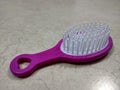 Baby hair brush in pink color Royalty Free Stock Photo