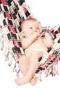 Baby in hammock on white background