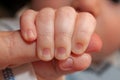 Baby Hand Holding Adult Parent Finger Royalty Free Stock Photo