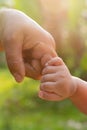 Baby hand holding mother finger Royalty Free Stock Photo