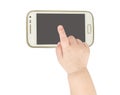 Baby hand pointing white smart phone Royalty Free Stock Photo