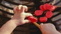 Baby hands cutting plasticine - fine motor skill develop dexterity - pov above view Royalty Free Stock Photo