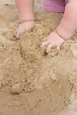 Baby hands in sand Royalty Free Stock Photo