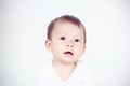 Baby happy on the white background, new family and love concept soft focus on the eyes Royalty Free Stock Photo