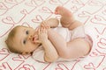 Baby on hearts Royalty Free Stock Photo