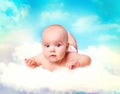 Baby in heaven.Infant over sky.