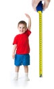 Kid growing measuring with ruler