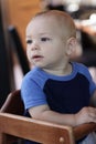 Baby in highchair Royalty Free Stock Photo