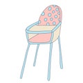 Baby highchair decorated with polka dots