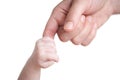 Baby holding mother's finger