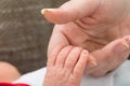 Baby holding parent finger Royalty Free Stock Photo