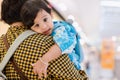 Baby hugging mother. Mother is holding her little baby boy. Royalty Free Stock Photo