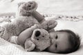 Baby hugging teddybear