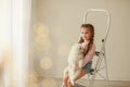 Baby Hugs the white fluffy puppy. Kids Royalty Free Stock Photo