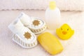 baby hygiene and bath items, shampoo bottle, baby soap, towel Royalty Free Stock Photo