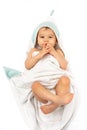 Cute baby wrapped into hooded towel after a bathing Royalty Free Stock Photo