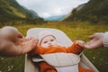 Baby infant in bouncer outdoor family travel lifestyle mother Royalty Free Stock Photo