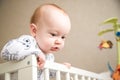 Baby infant boy in his bed Royalty Free Stock Photo