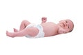 Baby infant boy lies in a diaper on the changing table, isolated on a whi Royalty Free Stock Photo