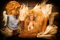 Baby Jesus care by an angel, Christmas cards Royalty Free Stock Photo