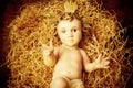 Baby Jesus in his crib. Royalty Free Stock Photo