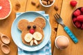 Baby or kid breakfast pancake in shape of dog