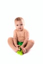 Baby kid, toddler in green diapers doing exercises with dumbbel Royalty Free Stock Photo