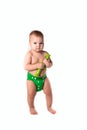 Baby kid, toddler in green diapers doing exercises with dumbbel Royalty Free Stock Photo