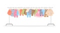 Baby kids boy and girl clothes on long hanger rack Royalty Free Stock Photo