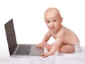 Baby, laptop and studio for portrait, fun and games in child development and curious technology. Infant, happy and Royalty Free Stock Photo