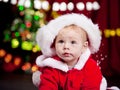 Baby in large Christmas hat