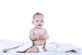 Baby laughing inside blanket - isolated Royalty Free Stock Photo