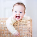 Baby in a laundry basket Royalty Free Stock Photo