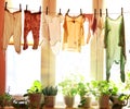 Baby laundry hanging on a clothesline
