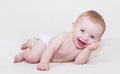 Baby Laying Down and Laughing Royalty Free Stock Photo