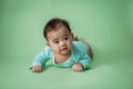 Tummy time cute baby in studio Royalty Free Stock Photo