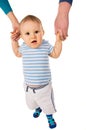 The baby learns to do the first steps Royalty Free Stock Photo