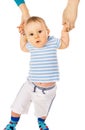 The baby learns to do the first steps Royalty Free Stock Photo