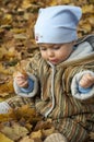 Baby in leaves