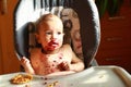Baby led weaning - Surprised baby eating blueberries