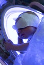 The baby lies under an ultraviolet lamp with jaundice Royalty Free Stock Photo