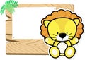 Baby lion on wooden board