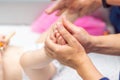 Baby massage closeup. Mother and child. Newborn.